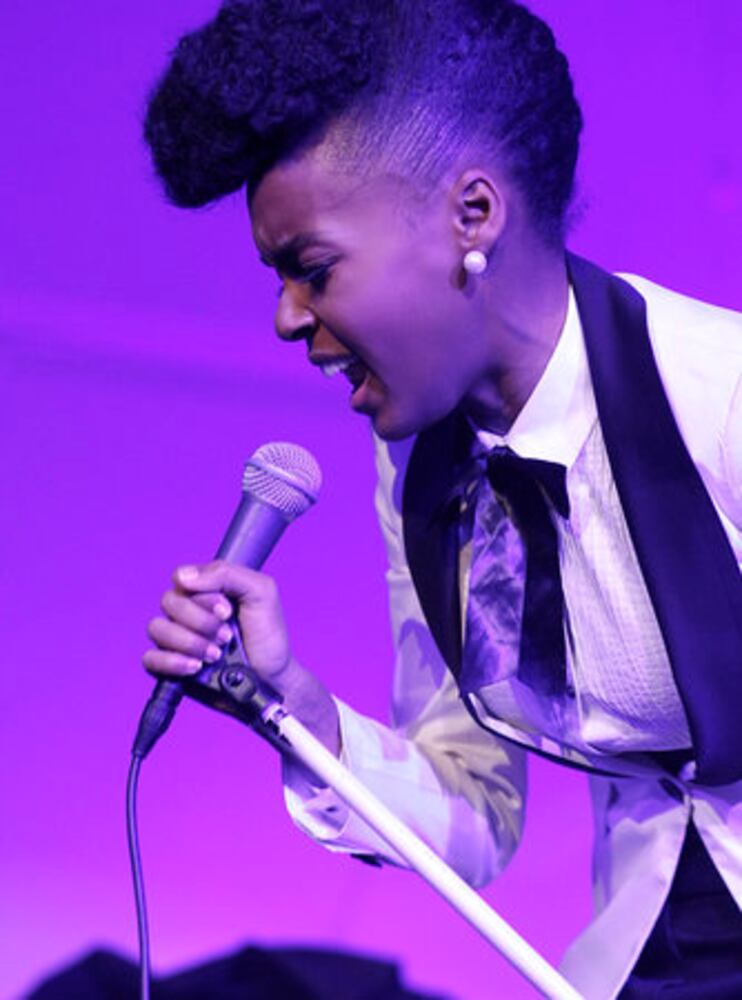 Janelle Monae sings at Chloe boutique in LA