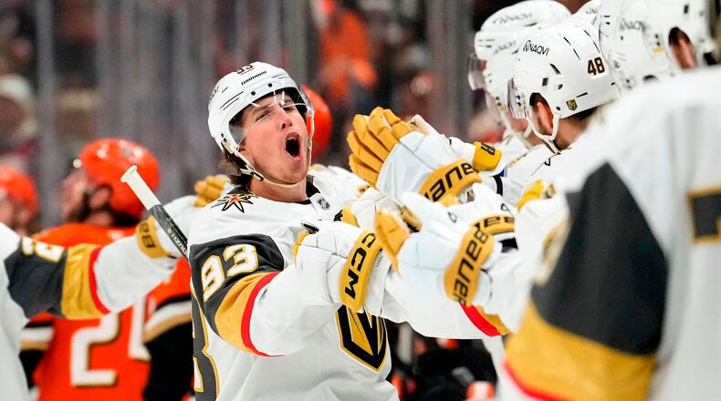 Vegas Golden Knights right wing Mitch Marner, second from left, celebrates his goal with teammates during the first period in Game 6 of a second-round NHL hockey Stanley Cup playoff series against the Anaheim Ducks, Thursday, May 14, 2026, in Anaheim, Calif. (AP Photo/Mark J. Terrill)
