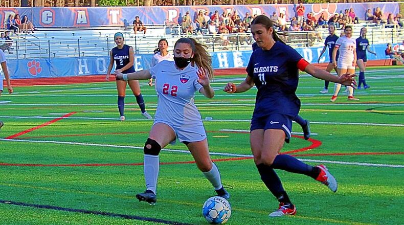 Senior Lily Garrigan (11) leads fourth-ranked Dunwoody into the playoffs Tuesday, when the Wildcats take on Etowah in the first round of the Class 7A tournament.