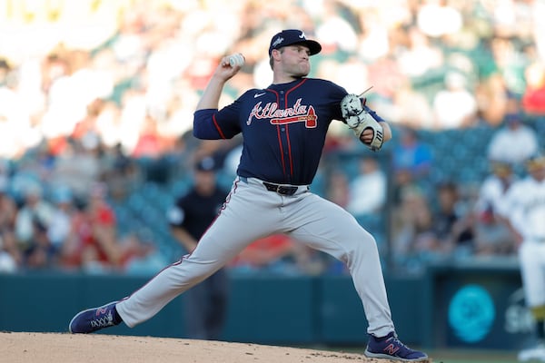 Atlanta Braves starting pitcher Bryce Elder throws to an Athletics batter during the first inning of a baseball game Wednesday, July 9, 2025, in West Sacramento, Calif. (AP Photo/Sergio Estrada)