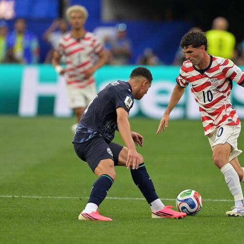 United States' Christian Pulisic (10) dribbles past Paraguay's Juan Jose Caceres during the World Cup Group D soccer match in Inglewood, Calif., near Los Angeles, Friday, June 12, 2026. (AP Photo/Jayne Kamin-Oncea)
