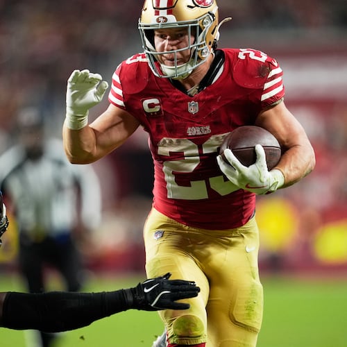 San Francisco 49ers running back Christian McCaffrey runs for a touchdown against the Carolina Panthers during the second half an NFL football game, Monday, Nov. 24, 2025, in Santa Clara, Calif. (AP Photo/Godofredo A. Vásquez)