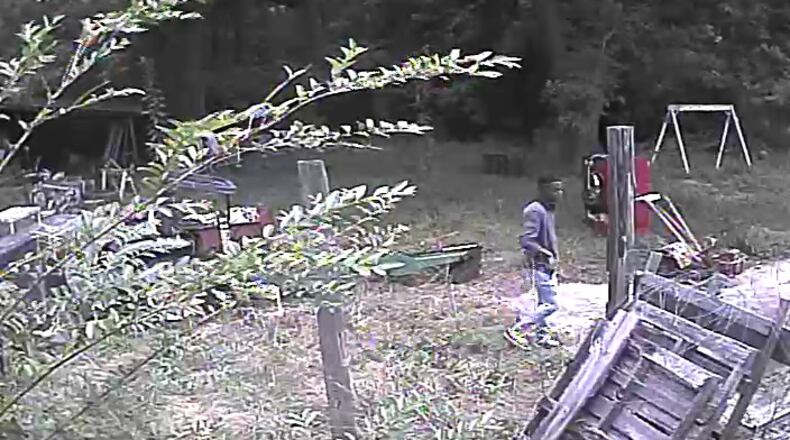 This is a photo of a suspect being sought by authorities in connection with an armed bank robbery.