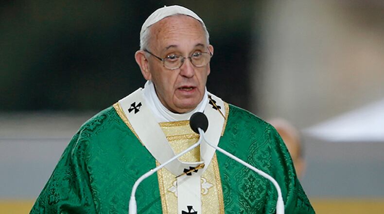Pope Francis delivers his homily while celebrating Mass Sunday, Sept. 27, 2015, in Philadelphia. (AP Photo/Matt Slocum)