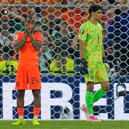 Netherlands' Crysencio Summerville (24) reacts after missing a penalty as Morocco goalkeeper Yassine Bounou (1) walks past during the World Cup round of 32 soccer match between the Netherlands and Morocco in Guadalupe, near Monterrey, Mexico, Monday, June 29, 2026. (AP Photo/Ricardo Mazalan)