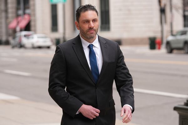 Former NFL and University of Michigan assistant football coach Matt Weiss leaves federal court in Detroit, Monday, March 24, 2025. (AP Photo/Paul Sancya)
