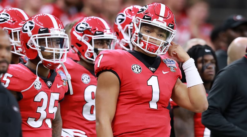 Georgia quarterback Justin Fields watches from the sidelines during the first half of the Sugar Bowl Tuesday, Jan. 1, 2019, at Mercedes-Benz Superdome in New Orleans.