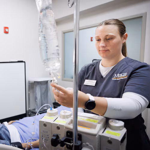 Catherine Costner trains in Mercer University’s nursing simulation lab at its Macon campus. (Courtesy of Leah Yetter)