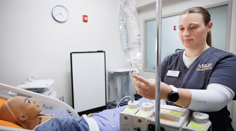 Catherine Costner trains in Mercer University’s nursing simulation lab at its Macon campus. (Courtesy of Leah Yetter)