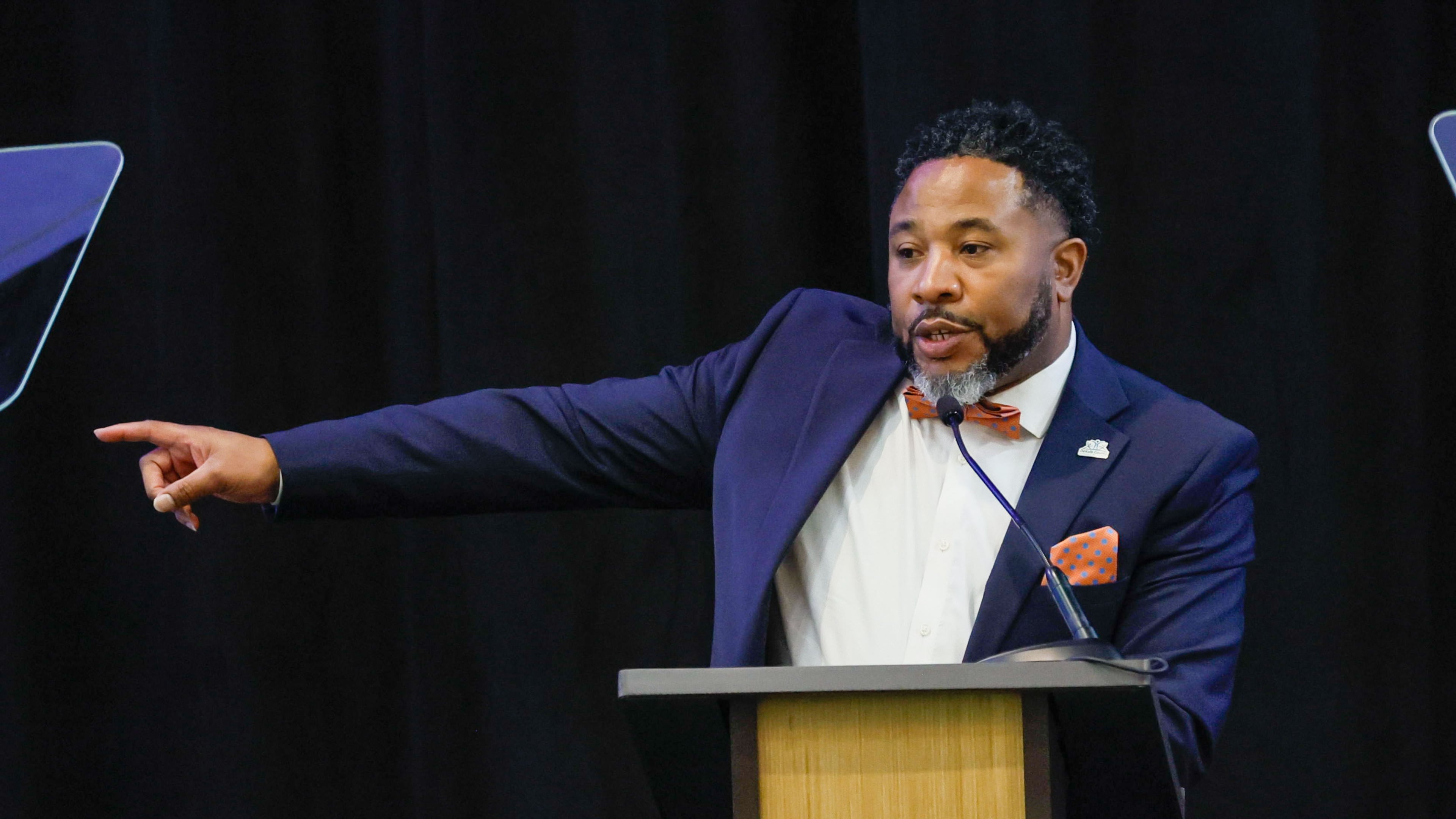 Devon Horton — pictured speaking at the State of the District Address in March 2024 — has resigned as DeKalb County's school superintendent in the wake of a federal indictment on charges that he accepted kickbacks in his previous job in Illinois. (Miguel Martinez/AJC 2024)