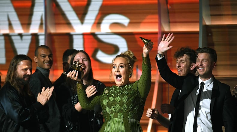 LOS ANGELES, CA - FEBRUARY 12: Recording artist Adele, winner of Album of the Year for '25,' speaks onstage during The 59th GRAMMY Awards at STAPLES Center on February 12, 2017 in Los Angeles, California. (Photo by Kevork Djansezian/Getty Images)