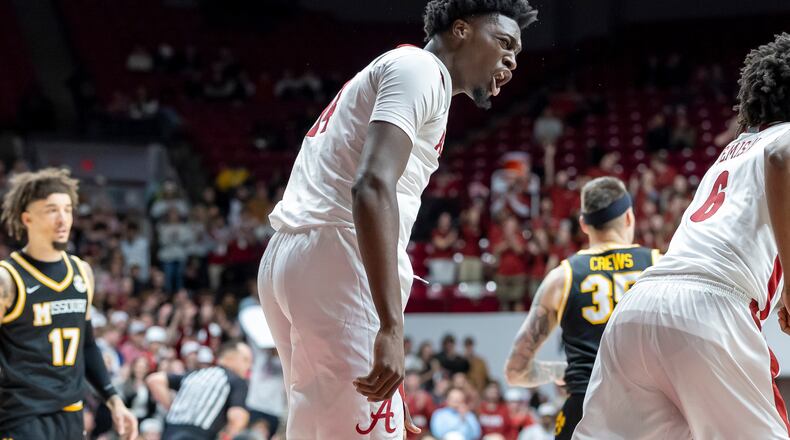 Alabama center Charles Bediako (14) cheers to his teammates after a score against Missouri during the second half of an NCAA college basketball game Tuesday, Jan. 27, 2026, in Tuscaloosa, Ala. (AP Photo/Vasha Hunt)