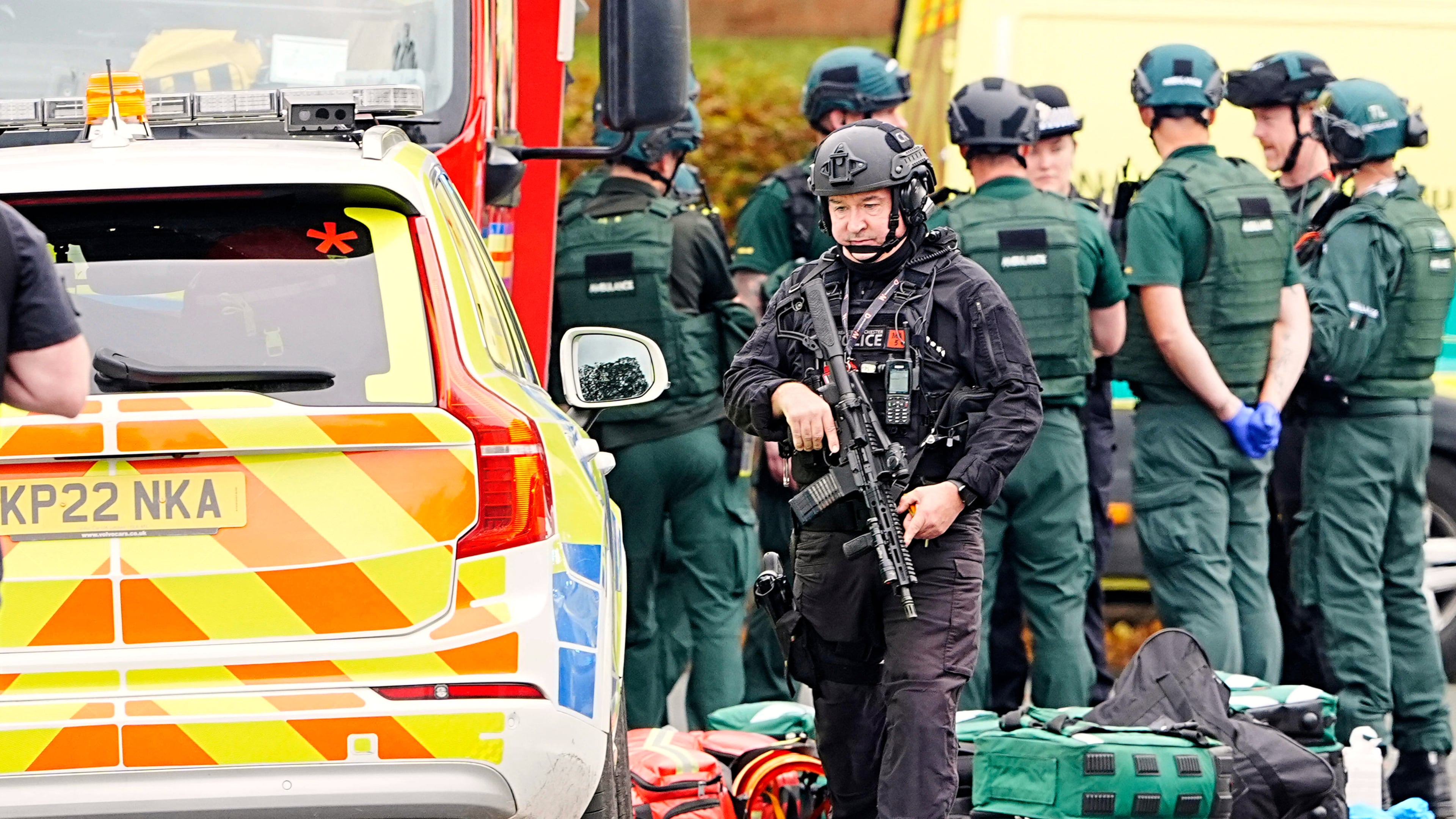 An armed police officer at the scene of a stabbing incident at Heaton Park Hebrew Congregation synagogue, in Crumpsall, Manchester, England, Thursday Oct. 2, 2025. (Peter Byrne/PA via AP)