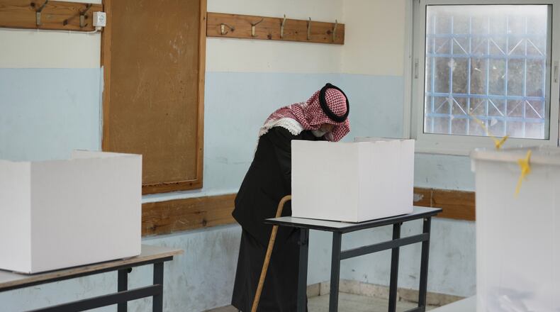 A Palestinian man votes in local elections, the first in two decades in Gaza and the first in the occupied West Bank since the start of the Israel-Hamas war in Al-Ubaidiya, West Bank, Saturday, April 25, 2026. (AP Photo/Mahmoud Illean)