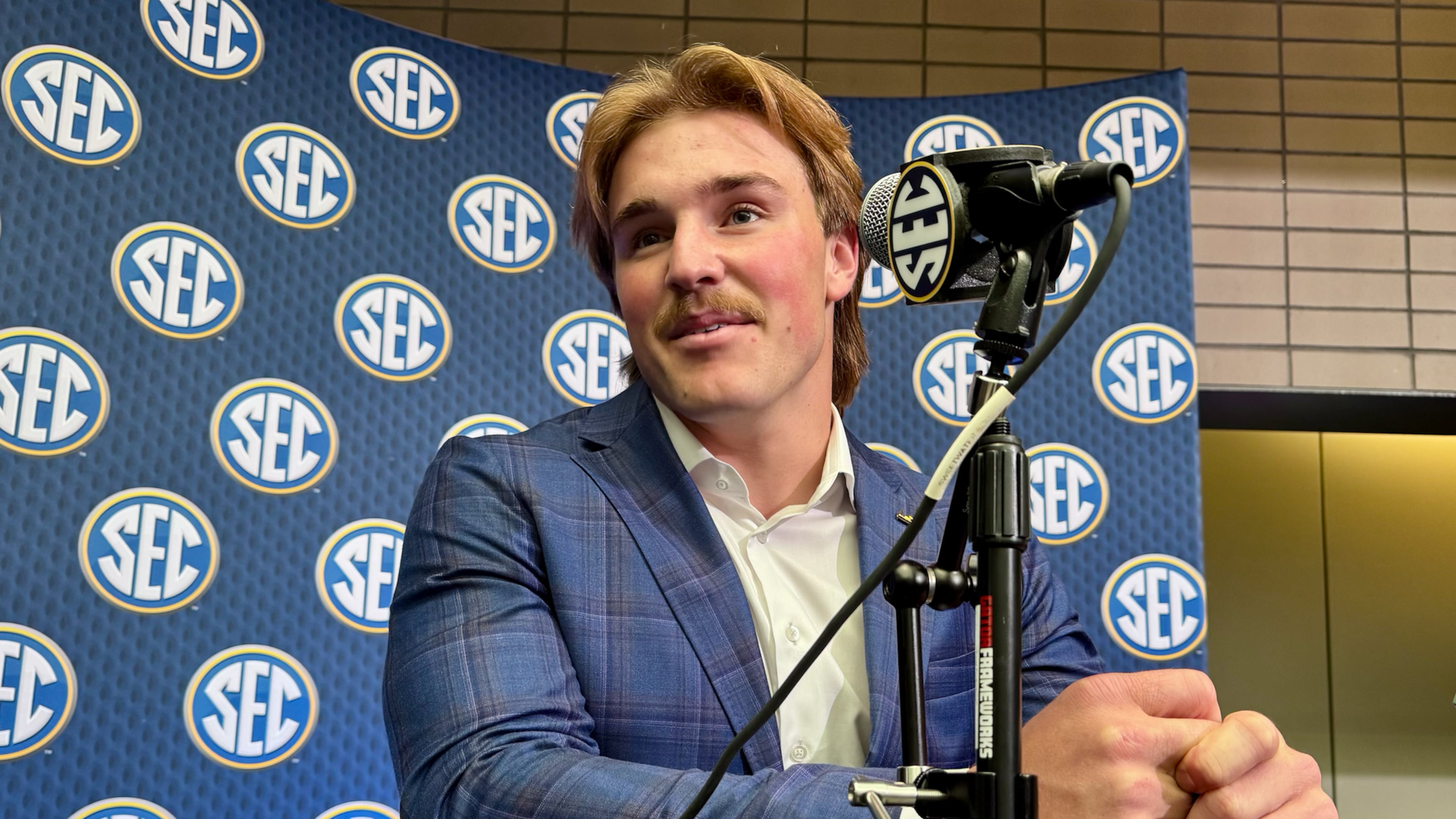LSU linebacker Whit Weeks, from Oconee County, speaks during SEC Media Days on July 14, 2025. (Mike Griffith/AJC)