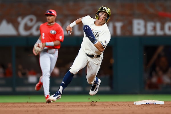 Georgia Tech’s Jarren Advincula heads to third during the Yellow Jackets' run-rule romp over Georgia in April. (Jason Getz/AJC)
