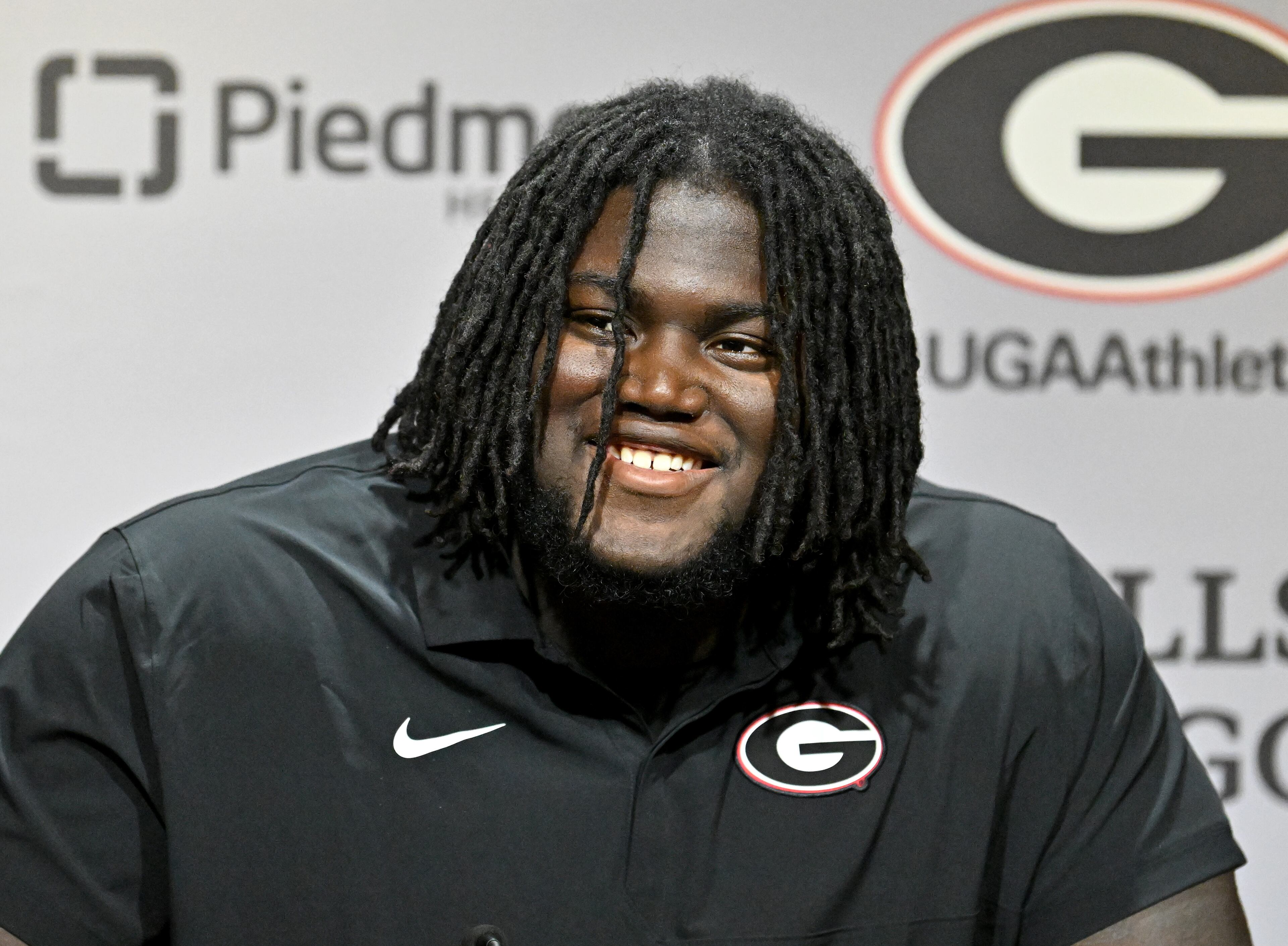 Georgia offensive lineman Micah Morris speaks to members of the press during a press conference ahead of their football practice at the Butts-Mehre Building, Thursday, July 31, 2025, in Athens. (Hyosub Shin / AJC)