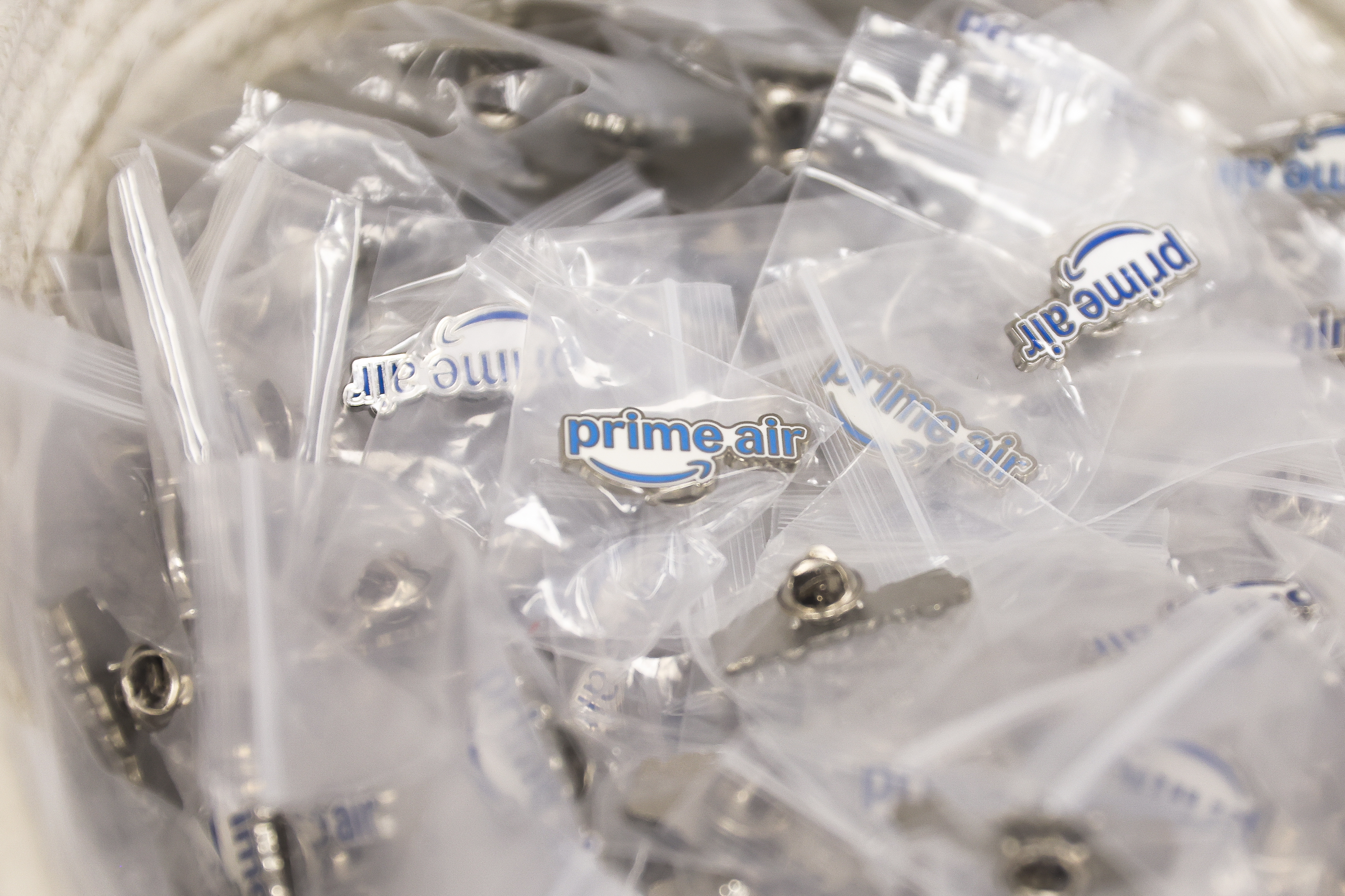 Amazon Prime Air pins were offered to community members during an information session on Thursday in Snellville. (Abbey Cutrer/AJC)
