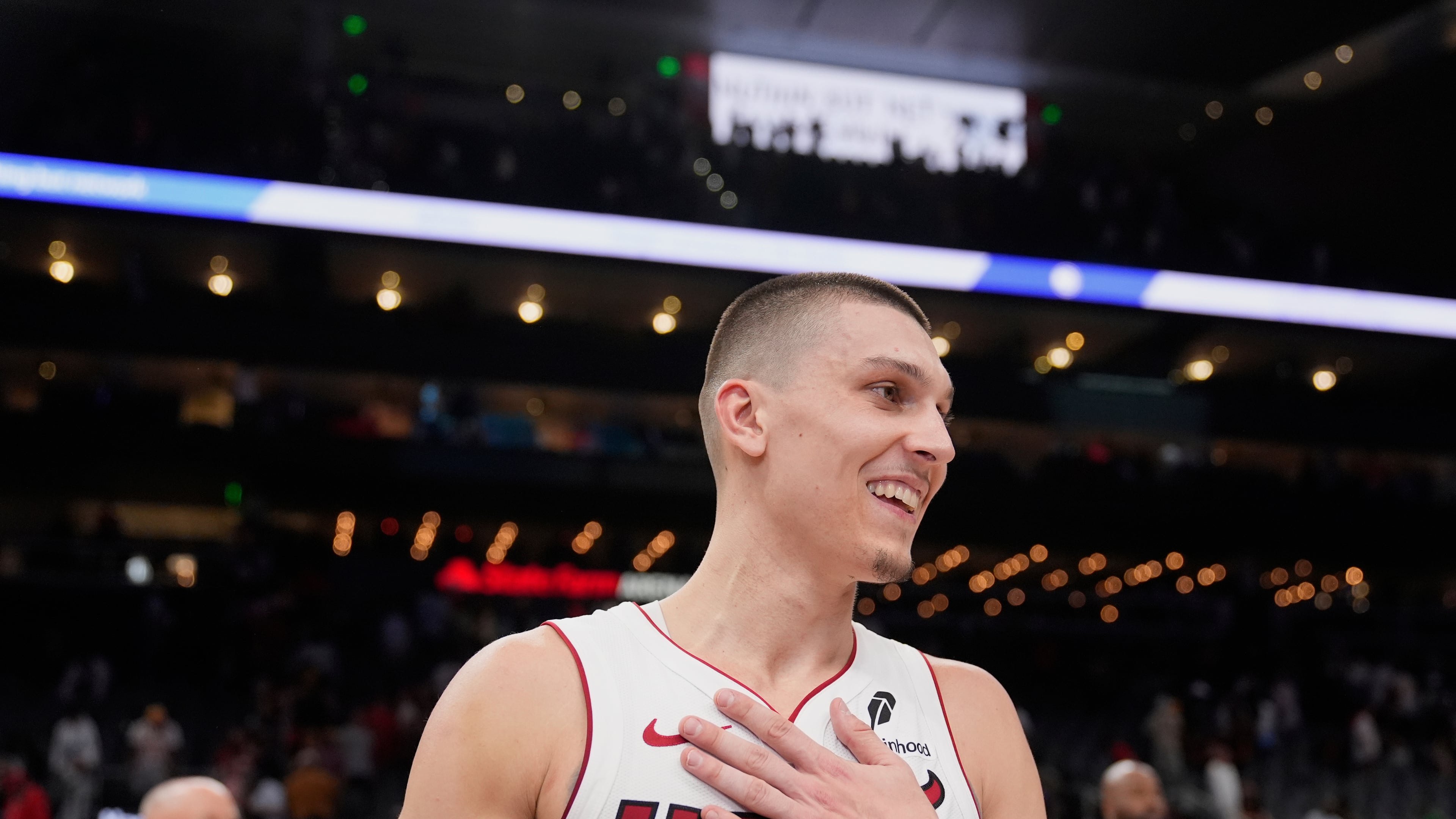 FILE - Miami Heat guard Tyler Herro (14) reacts to a win over the Atlanta Hawks in an NBA play-in tournament basketball, Friday, April 18, 2025, in Atlanta. (AP Photo/Brynn Anderson, File)