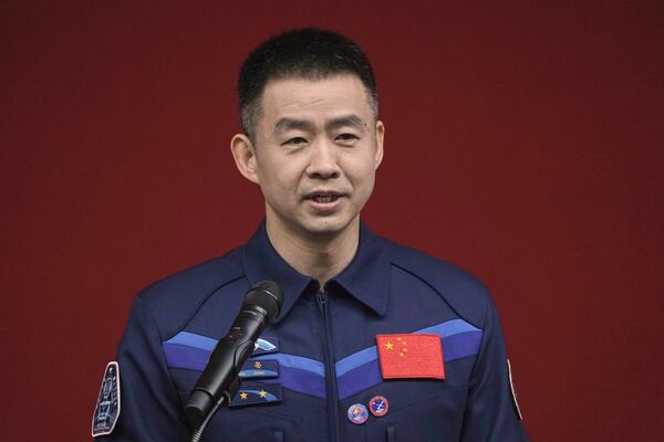 Chinese astronaut for the upcoming Shenzhou 20 mission Chen Dong speaks during a meeting with media members at the Jiuquan Satellite Launch Center in northwest China, Wednesday, April 23, 2025. (AP Photo/Andy Wong)