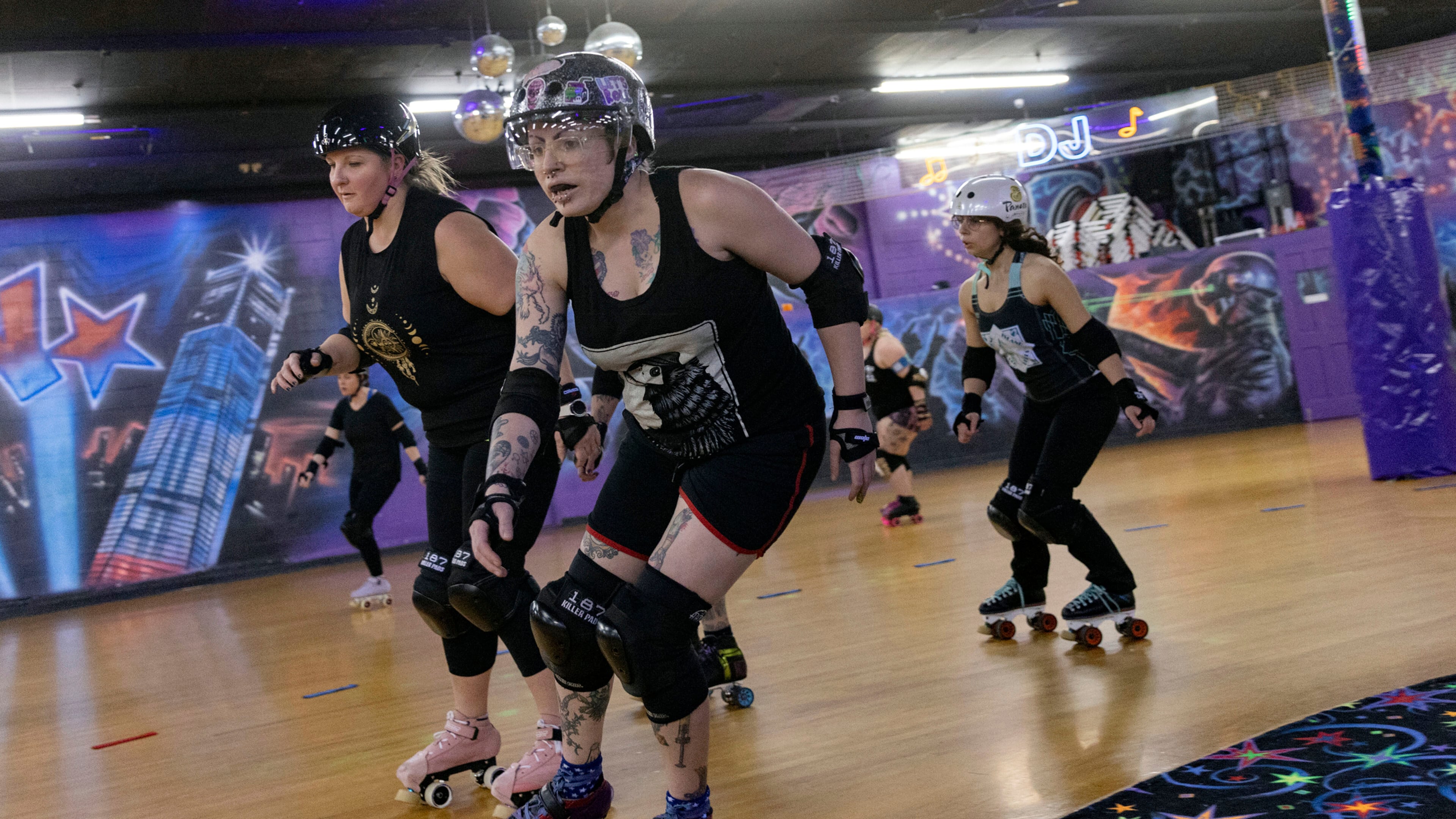 FILE - Members of the Long Island Roller Rebels practice, Mar. 19, 2023, at United Skates of America, in Seaford, NY. (AP Photo/Jeenah Moon, File)