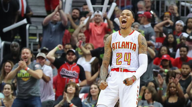 Atlanta Hawks’ Kent Bazemore and fans celebrate as he hits a 3-pointer against the Washington Wizards on the way to a 116-98 victory in Game 3 of a first-round NBA basketball playoff series on Saturday, April 22, 2017, in Atlanta. Curtis Compton/ccompton@ajc.com