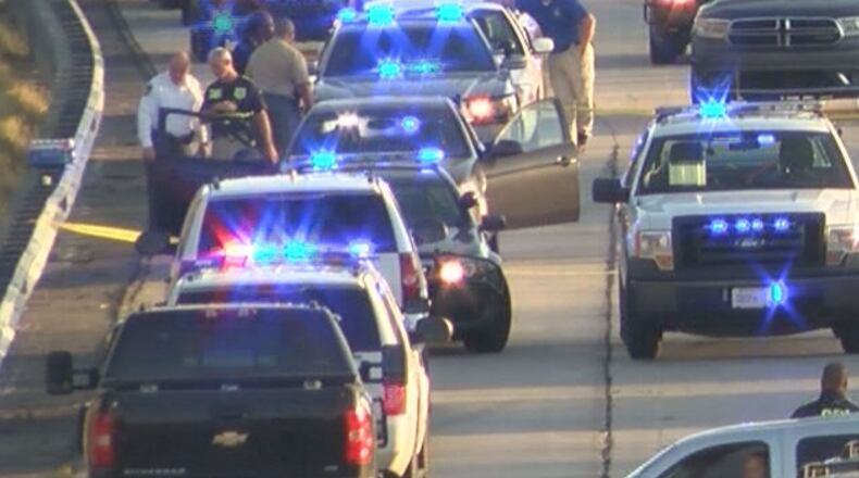 A man running from police on I-75 in south Georgia killed himself and three other people were shot when a state trooper’s weapon accidentally discharged, the Georgia Bureau of Investigation said Friday. (Credit: WALB-TV)