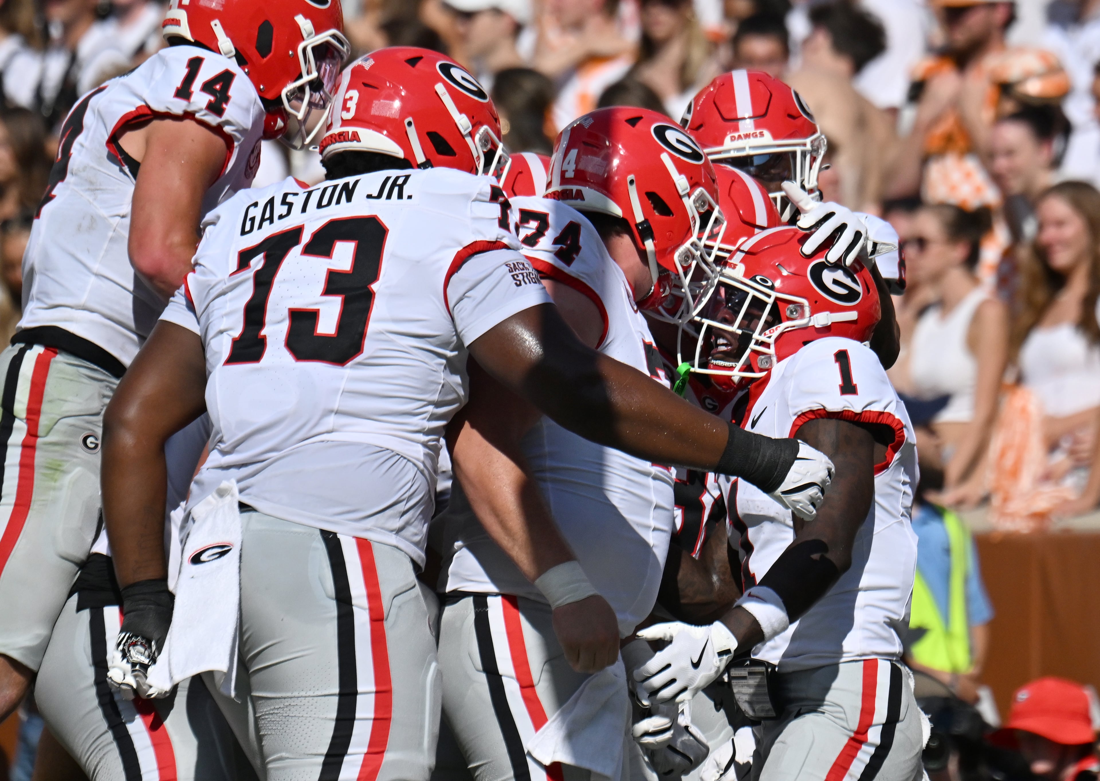 Georgia wide receiver Zachariah Branch (right) celebrates after scoring a touchdown during the first half against Tennessee at Neyland Stadium on Saturday, Sept. 13, 2025, in Knoxville, Tenn. (Hyosub Shin/AJC)