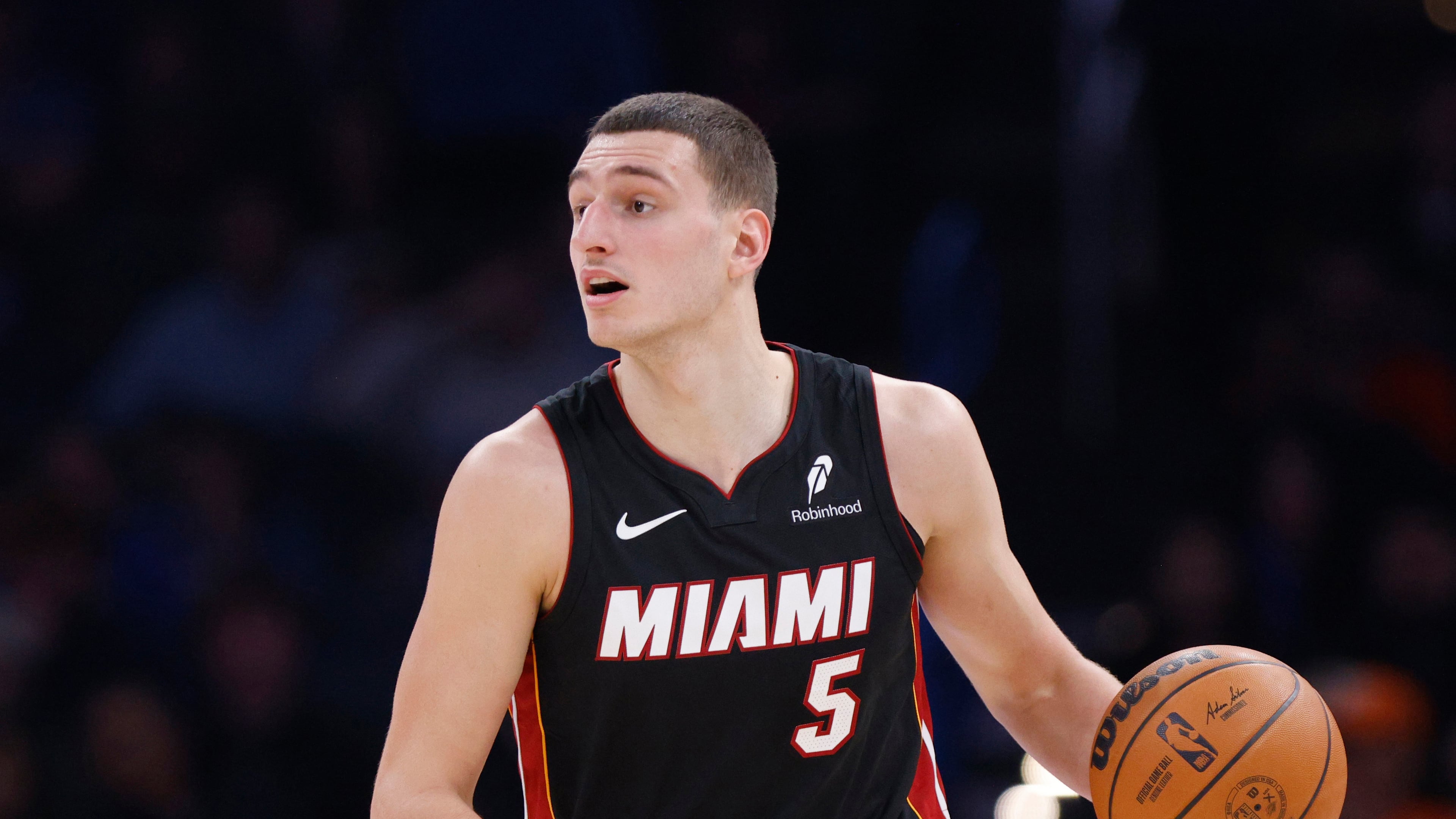 FILE - Miami Heat forward Nikola Jovic dribbles during the first half of an NBA basketball game against the Oklahoma City Thunder, Feb. 12, 2025, in Oklahoma City. (AP Photo/Nate Billings, File)