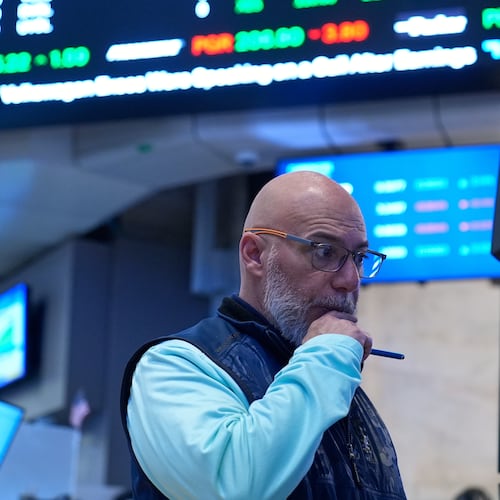 Traders work on the floor at the New York Stock Exchange in New York, Tuesday, March 10, 2026. (AP Photo/Seth Wenig)