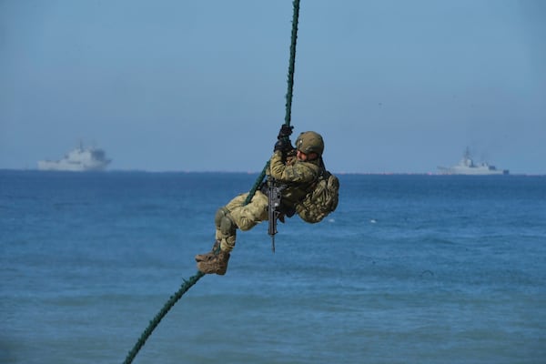 FILE - A Turkish Navy soldier participates during the NATO Dynamic Mariner/Flotex-25 naval exercise in Barbate, southern Spain, Friday, March 28, 2025. (AP Photo/Bernat Armangue, File)