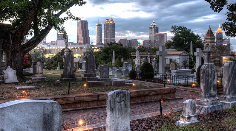 Oakland Cemetery, shown with Atlanta's skyline as its backdrop, is one of 36 destinations participating in the metro area's inaugural Museum Week, April 25 to May 1. CONTRIBUTED BY REN AND HELEN DAVIS