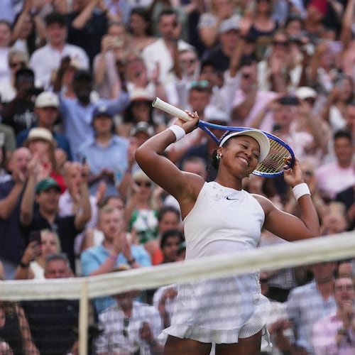 Naomi Osaka of Japan celebrates her victory against Aryna Sabalenka of Belarus in their fourth round women's singles match at the Wimbledon Tennis Championships in London, Sunday, July 5, 2026. (AP Photo/Brian Inganga)