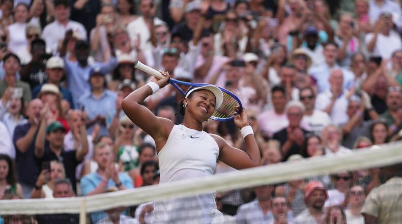Naomi Osaka of Japan celebrates her victory against Aryna Sabalenka of Belarus in their fourth round women's singles match at the Wimbledon Tennis Championships in London, Sunday, July 5, 2026. (AP Photo/Brian Inganga)