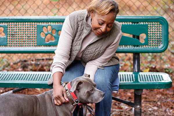After losing her job at the CDC, Benita Harris was put on a DEI watchlist and her home was doxxed, causing her to get a gun and trained dog, Comet, for protection. (Natrice Miller/ AJC 2025)