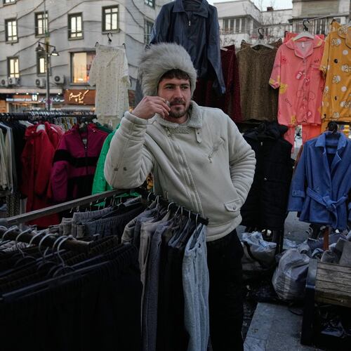A vendor waits for customers at Tajrish Sq. in Tehran, Iran, Tuesday, Jan. 27, 2026. (AP Photo/Vahid Salemi)