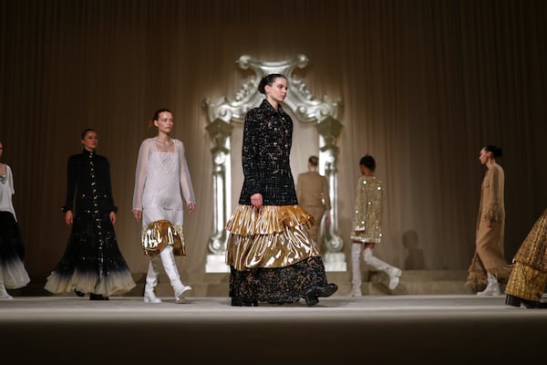 Models wear creations as part of the Chanel Fall-Winter 2025/26 Haute Couture collection presented Tuesday, July 8, 2025, in Paris. (AP Photo/Tom Nicholson)