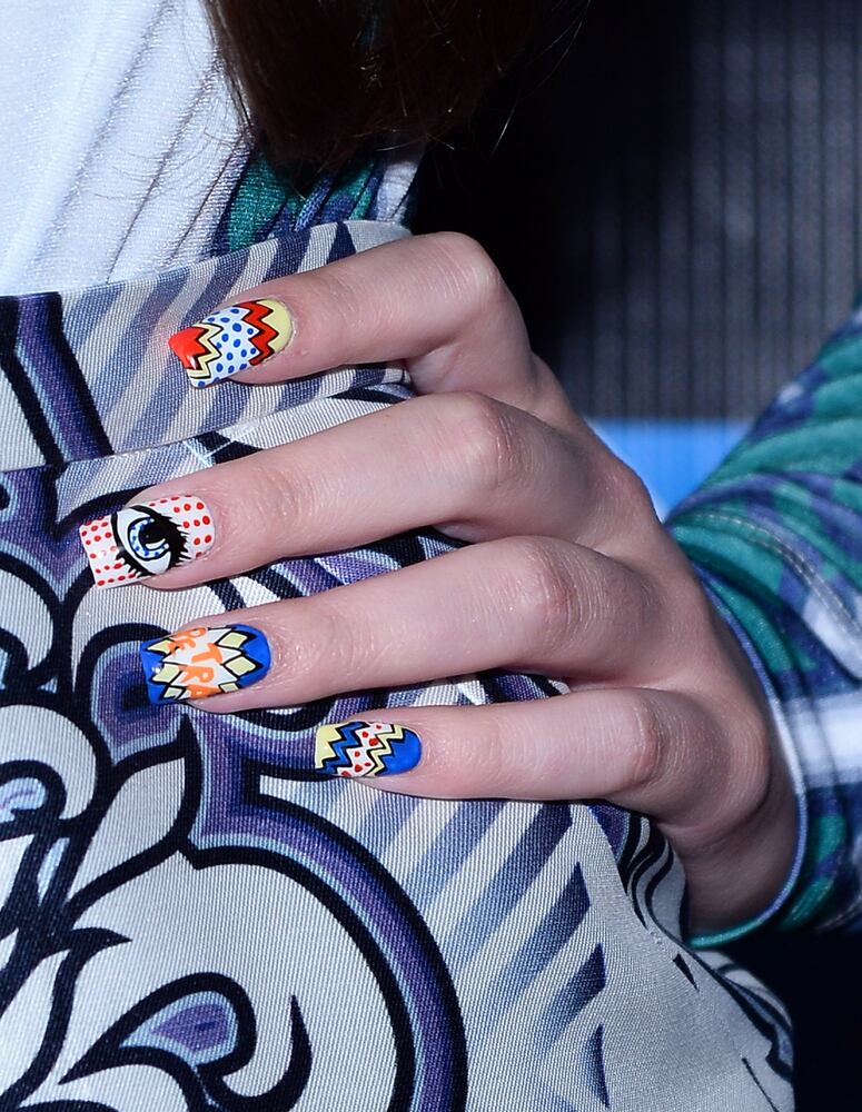 This teen star shows true grit with her manicure. Who is it?