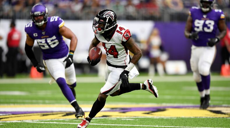 MINNEAPOLIS, MINNESOTA - SEPTEMBER 08: Wide receiver Justin Hardy #14 of the Atlanta Falcons runs the ball against the Minnesota Vikings in the game at U.S. Bank Stadium on September 08, 2019 in Minneapolis, Minnesota. (Photo by Hannah Foslien/Getty Images)