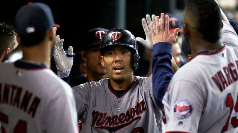 Kurt Suzuki (8) of the Minnesota Twins is congratulated after hitting a home run against the Detroit Tigers late last season. (Photo by Duane Burleson/Getty Images)