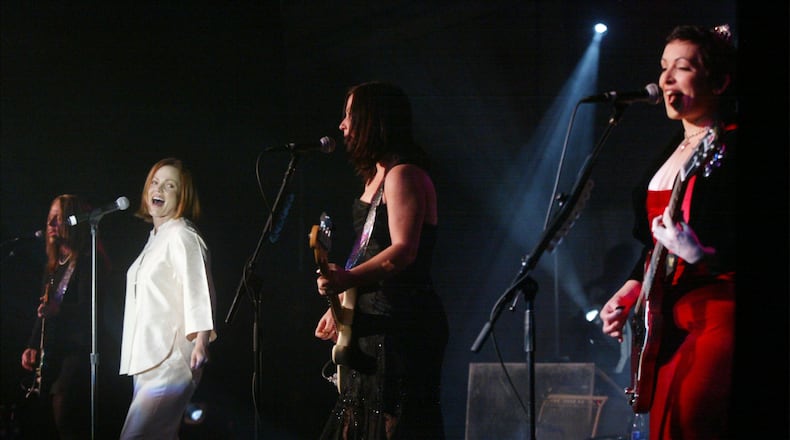 401745 06: The Go-Gos (L to R) Charlotte Caffey, Belinda Carlisle, Kathy Valentine, Jane Wiedlin perform at the Larry King Cardiac Foundation gala March 1, 2002 in Washington, DC. The Foundation was established in 1989 to provide funding for life-saving cardiac procedures for individuals who, due to limited means and inadequate insurance who would otherwise be unable to receive treatment. (Photo by Mark Wilson/Getty Images)