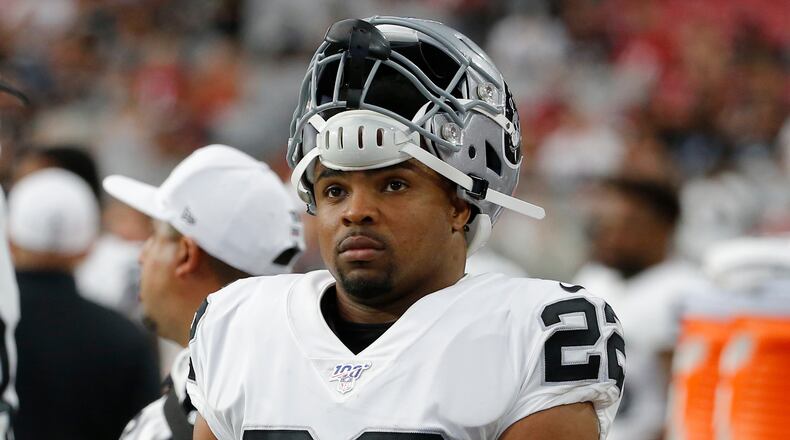 FILE - Oakland Raiders running back Doug Martin looks on during an NFL preseason football game against the Arizona Cardinals, Aug. 15, 2019, in Glendale, Ariz. (AP Photo/Rick Scuteri, File)