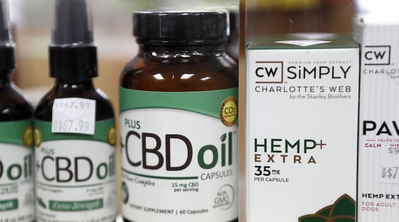 Discount Nutrition in Atlanta sells a type of cannabidiol made from hemp that contains trace amounts of THC. Across Georgia, stores are selling cannabis oil to the public, while registered medical marijuana patients can’t legally buy the product with higher amounts of THC. BOB ANDRES /BANDRES@AJC.COM