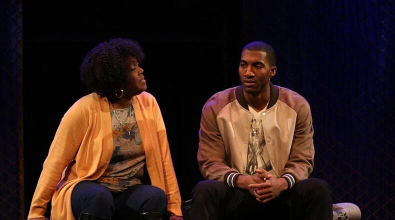 Theresa Hightower and Garrett Turner play a mother and son in “Holler if Ya Hear Me,” a musical inspired by rapper Tupac Shakur and directed by Kenny Leon at True Colors Theatre. CONTRIBUTED BY BILL RANSOM AND CAREY WILLIAMS
