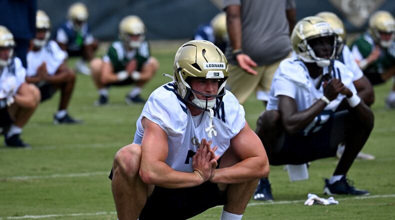 Georgia Tech's tight end Dylan Leonard (center) warms up during a training camp at Georgia Tech’s Rose Bowl Field, Tuesday, August 1, 2023, in Atlanta. (Hyosub Shin / Hyosub.Shin@ajc.com)