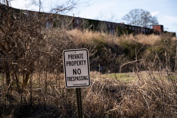 A "no trespassing" sign stands in front of the area of the failed Beltline development in Murphy Crossing on Tuesday, Jan. 14, 2025. (Olivia Bowdoin for the AJC). 