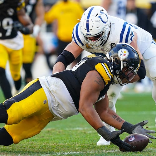 Pittsburgh Steelers defensive tackle Derrick Harmon (99) recovers a fumble in front of Indianapolis Colts guard Quenton Nelson (56) during the second half of an NFL football game in Pittsburgh, Sunday, Nov. 2, 2025. (AP Photo/Matt Freed)