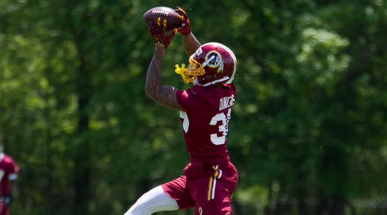 Washington Redskins safety Su'a Cravens, 36, works out during NFL football rookie minicamp Saturday, May 14, 2016, in Ashburn, Va. ( AP Photo/Jose Luis Magana)