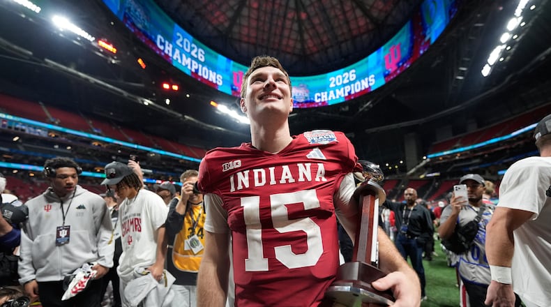 Indiana quarterback Fernando Mendoza celebrates a win against Oregon after the Peach Bowl on Friday, Jan. 9, 2026, in Atlanta. ESPN suggested 80% of the crowd was of Indiana persuasion. (Brynn Anderson/AP)