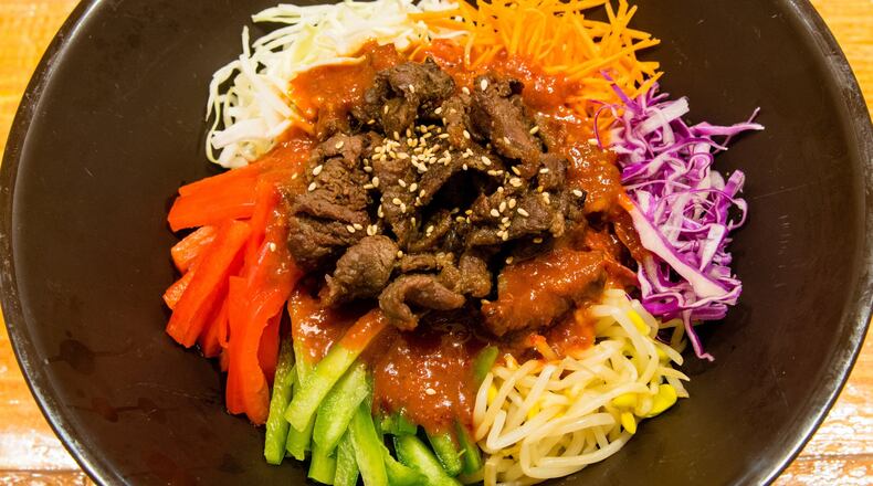 Sutbul bulgogi jaengban guksu combines noodles, vegetables and the traditional beef bulgogi at Dish Korean Cuisine. CONTRIBUTED BY HENRI HOLLIS